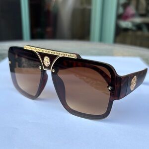 Gold and Brown Sunglasses with Modern Design